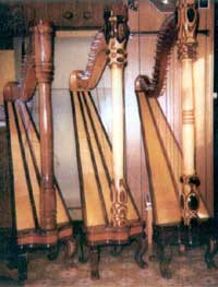 Two late 20th century cross-strung harps (left and center) by Emil Geering, BC Canada
(Photo by Francine Aylward)